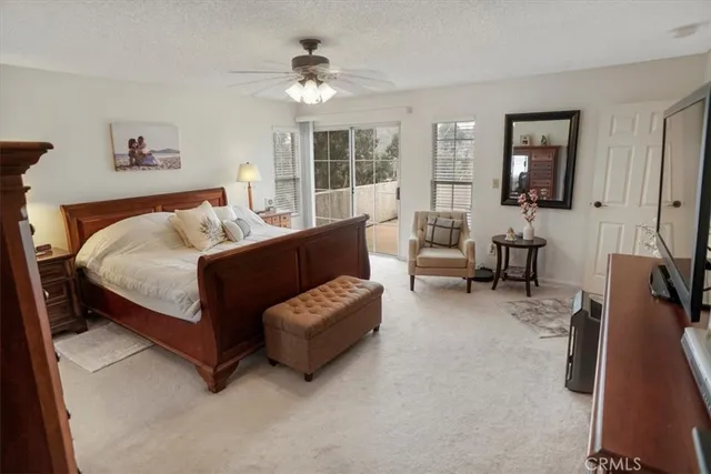 a bed room with furniture and a window