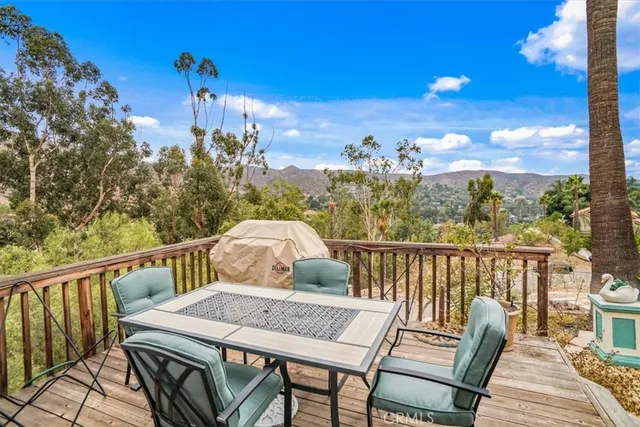 a view of a balcony with furniture