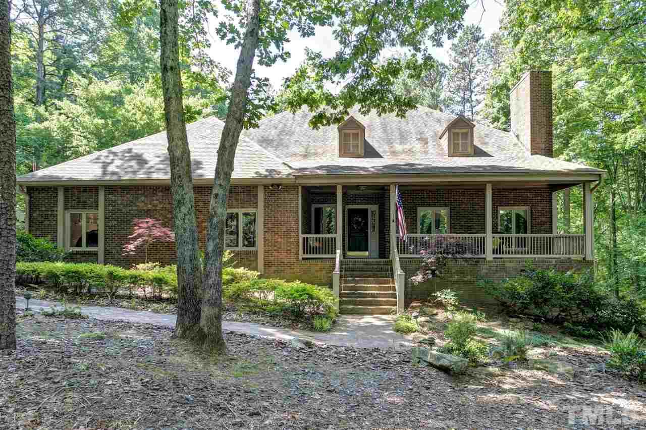 205 Trotters Ridge Drive Raleigh, NC 27614 - Photo 1 of 25 a front view of a house with garden
