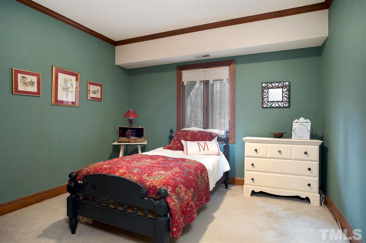 205 Trotters Ridge Drive Raleigh, NC 27614 - Photo 20 of 25 a bedroom with a bed and a dresser