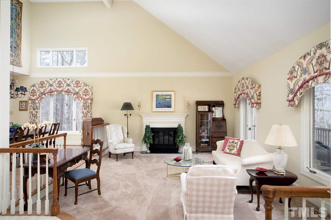 205 Trotters Ridge Drive Raleigh, NC 27614 - Photo 5 of 25 a living room with furniture fireplace and flat screen tv