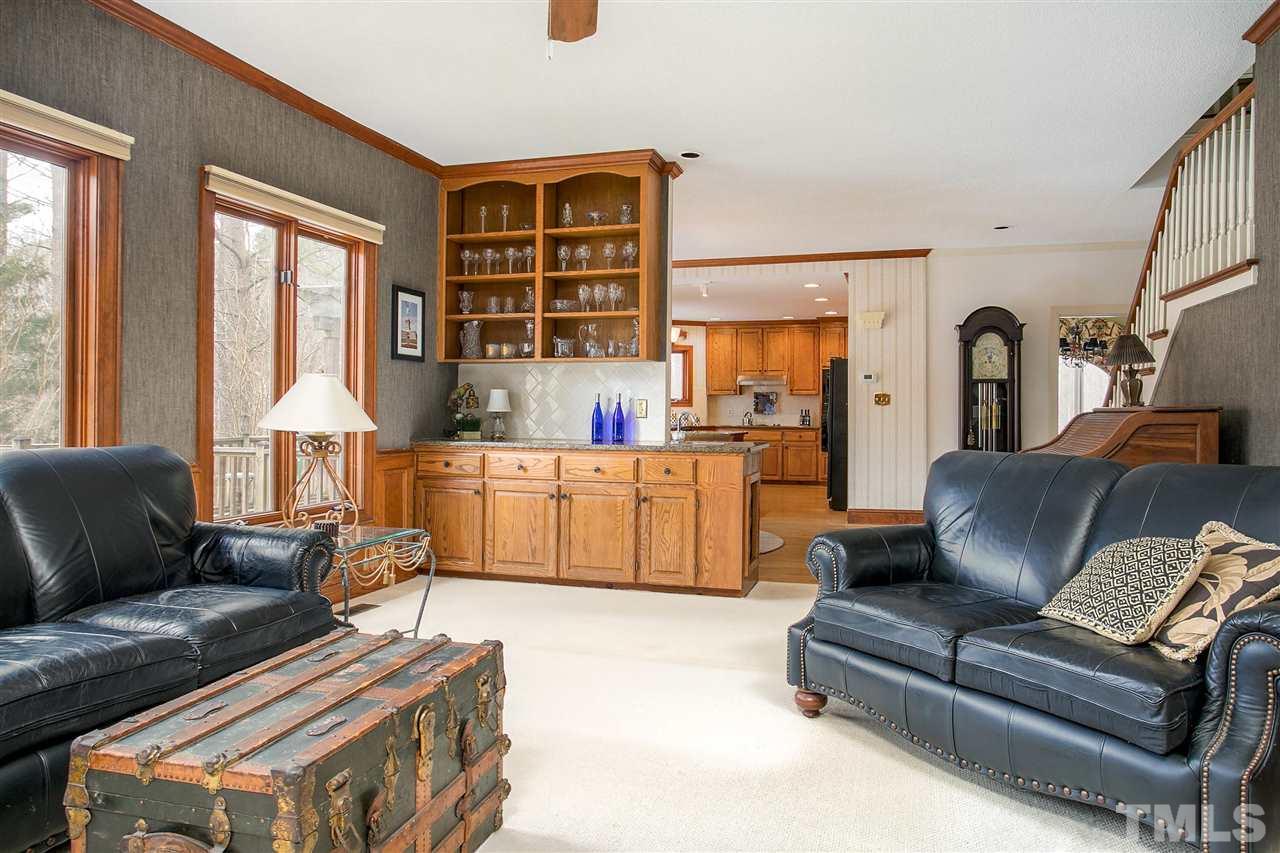 205 Trotters Ridge Drive Raleigh, NC 27614 - Photo 10 of 25 a living room with furniture and a large window