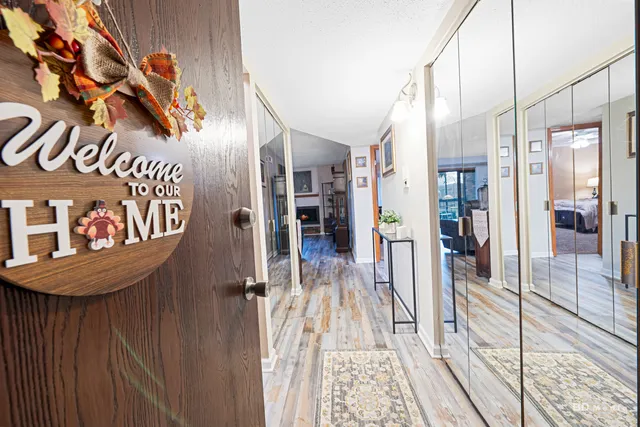 a view of a hallway with a furniture