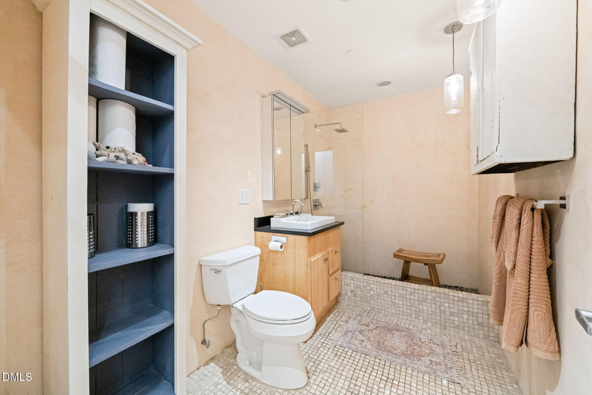 208 Rigsbee Avenue, Unit 206 Durham, NC 27701 - Photo 12 of 36 a bathroom with a toilet a sink and a mirror