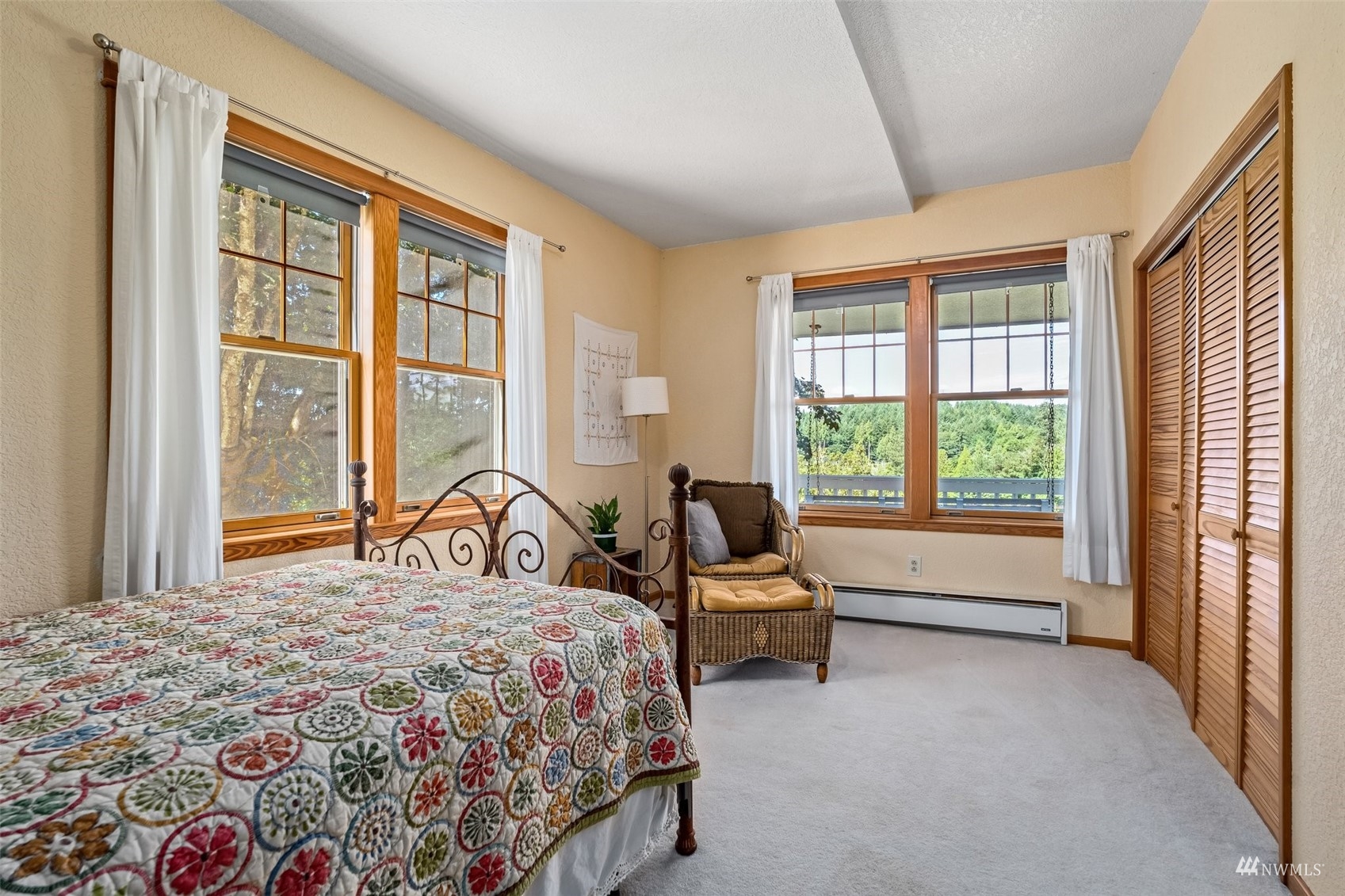 1295 Ferrier Road Winlock, WA 98596 - Photo 11 of 39 a bedroom with a bed couch and a large window