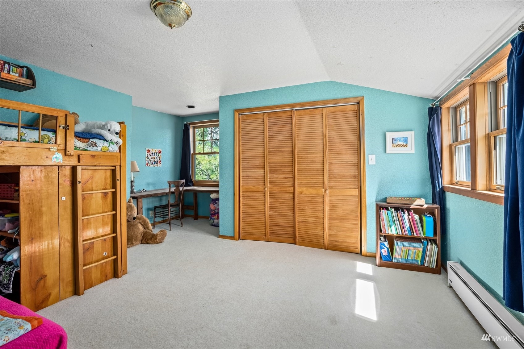 1295 Ferrier Road Winlock, WA 98596 - Photo 12 of 39 a view of an empty room with furniture and a window