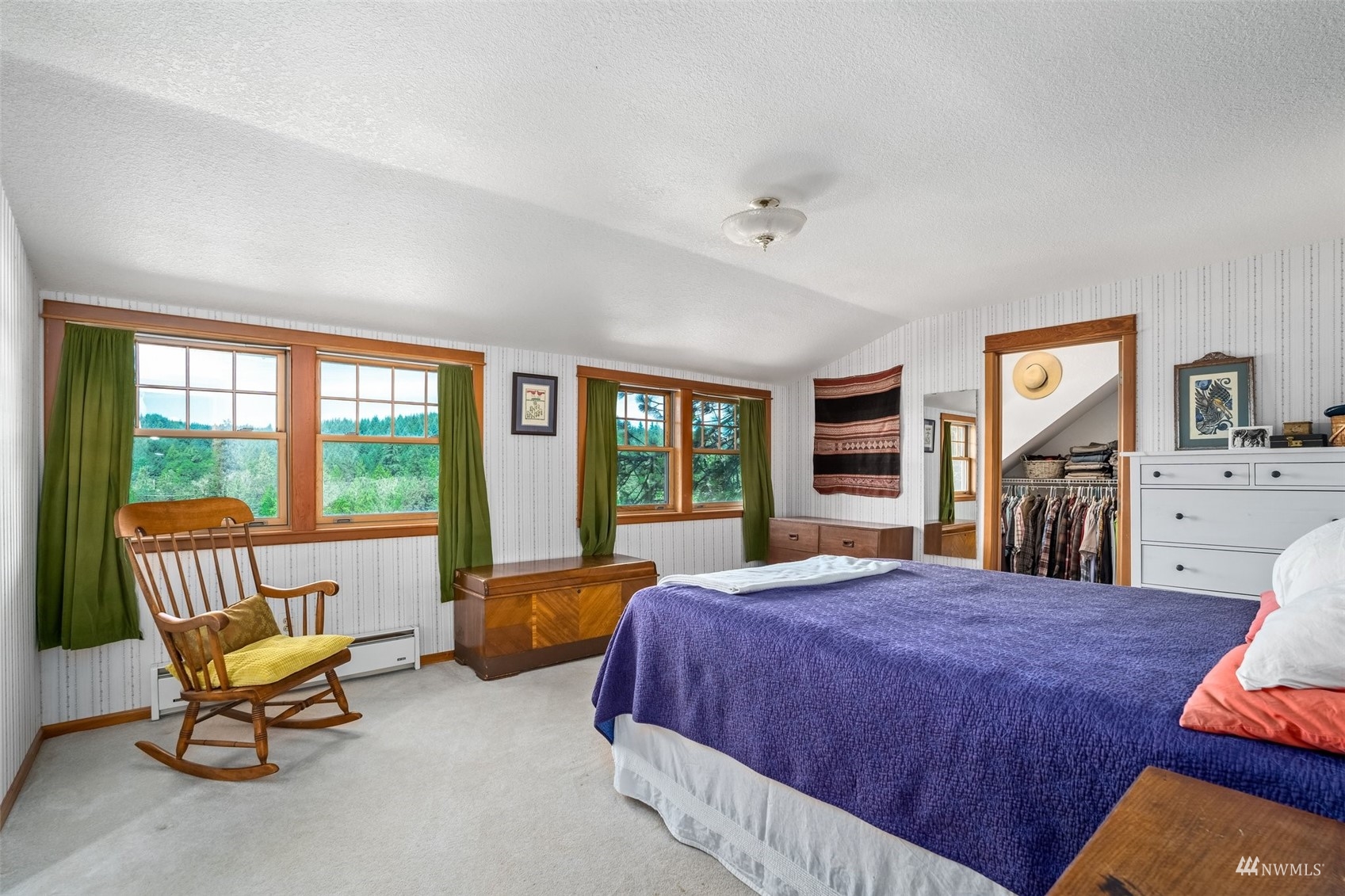 1295 Ferrier Road Winlock, WA 98596 - Photo 16 of 39 a spacious bedroom with a bed and a large window
