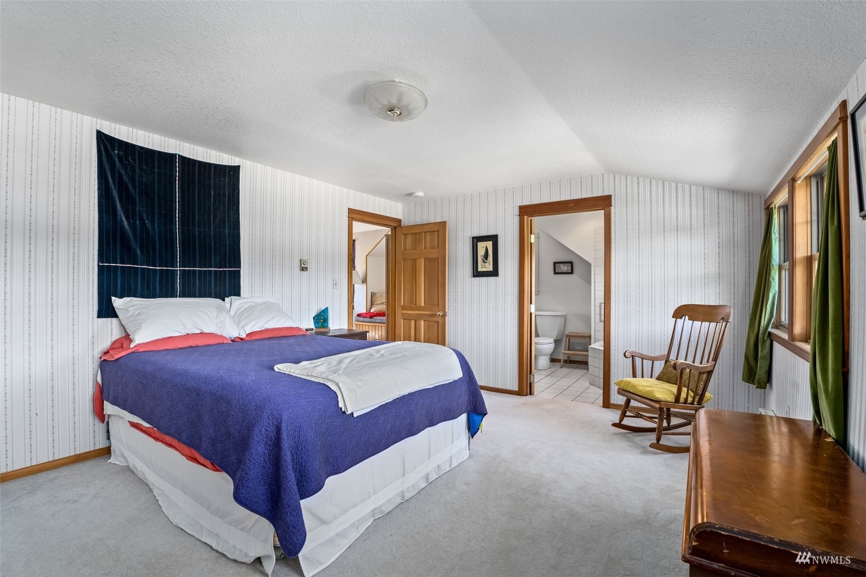 1295 Ferrier Road Winlock, WA 98596 - Photo 17 of 39 a bedroom with a bed a chair and piano