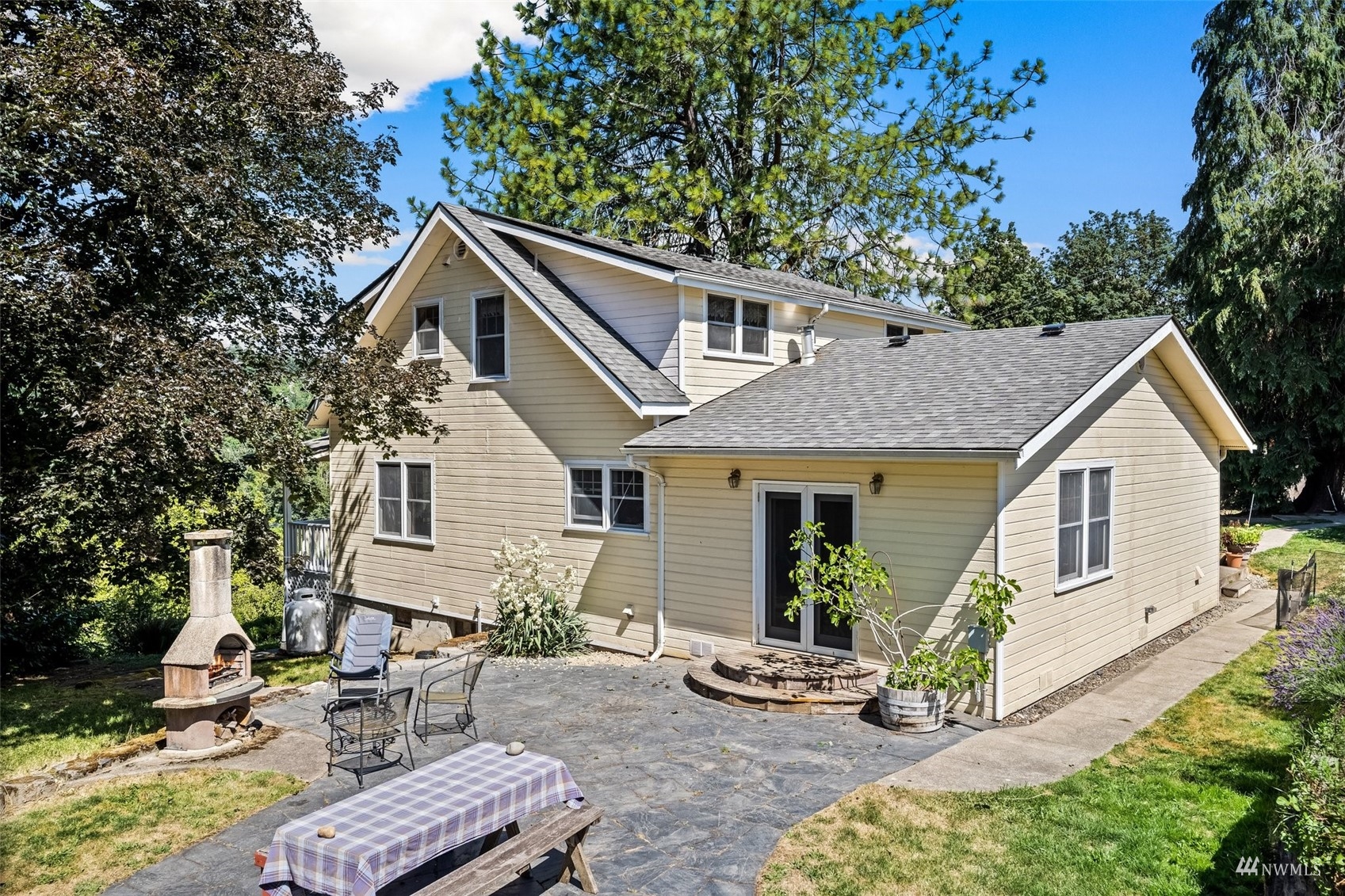 1295 Ferrier Road Winlock, WA 98596 - Photo 24 of 39 a view of a house with backyard and sitting area