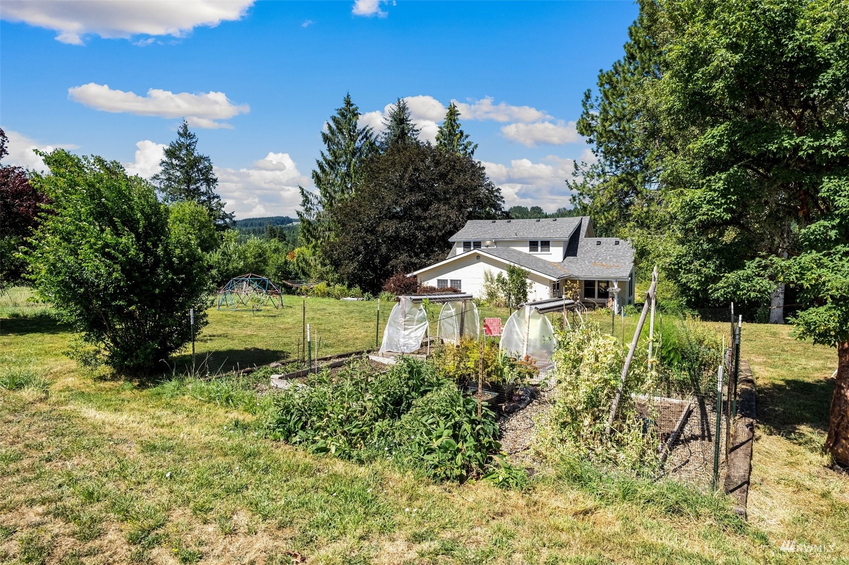 1295 Ferrier Road Winlock, WA 98596 - Photo 26 of 39 a view of a house with a yard