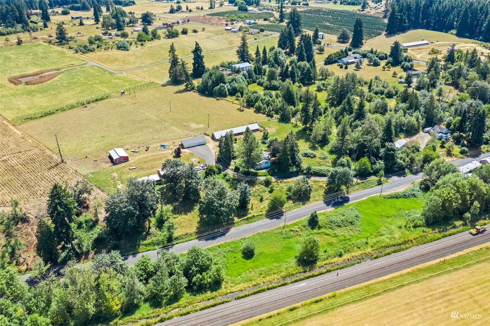1295 Ferrier Road Winlock, WA 98596 - Photo 39 of 39 an aerial view of residential houses with outdoor space and swimming pool