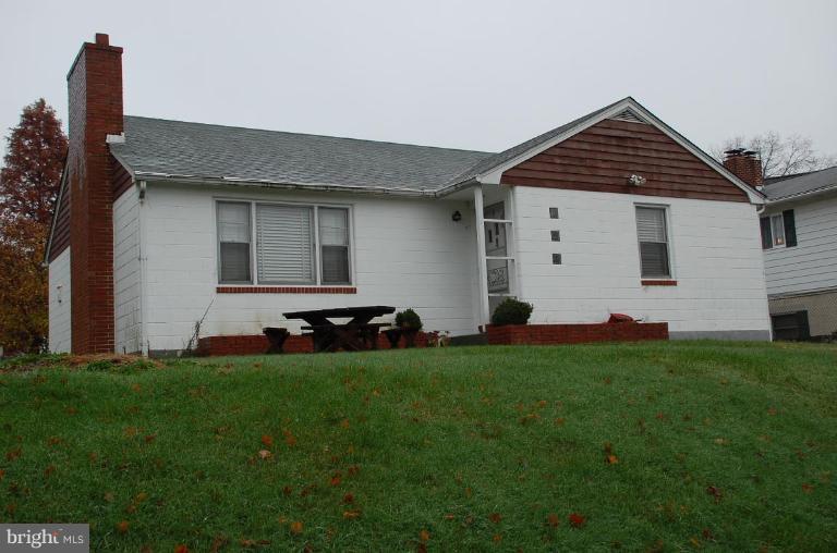 334 Wye Road Essex, MD 21221 - Photo 2 of 7 a front view of a house with a yard