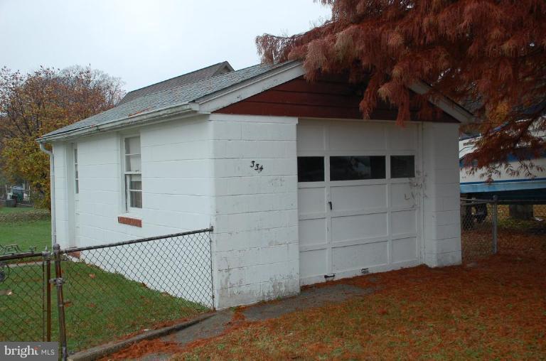 334 Wye Road Essex, MD 21221 - Photo 5 of 7 a view of a house with a garage
