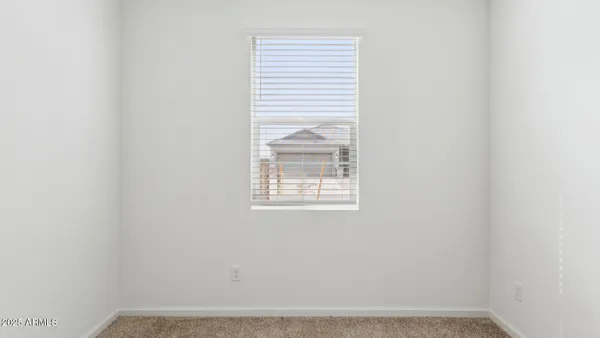 a view of a small space with window and a bathroom