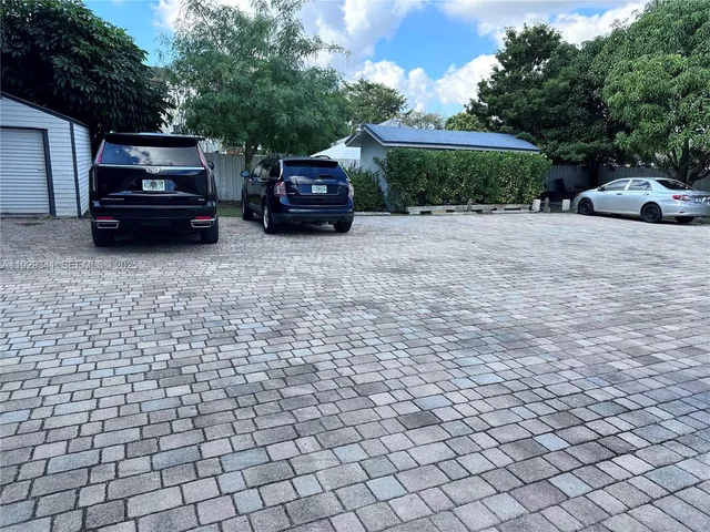 a car parked in front of a house