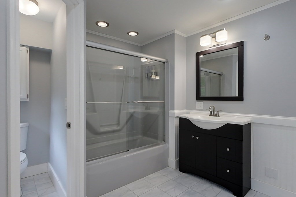 170 South Row Road Townsend, MA 01469 - Photo 19 of 42 a bathroom with a sink vanity granite tub and a mirror