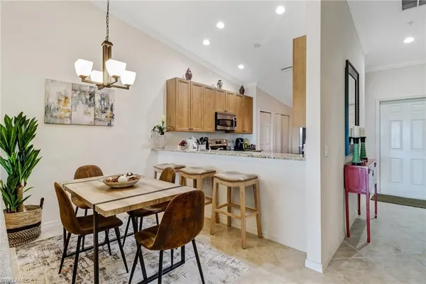 a view of a dining room with furniture