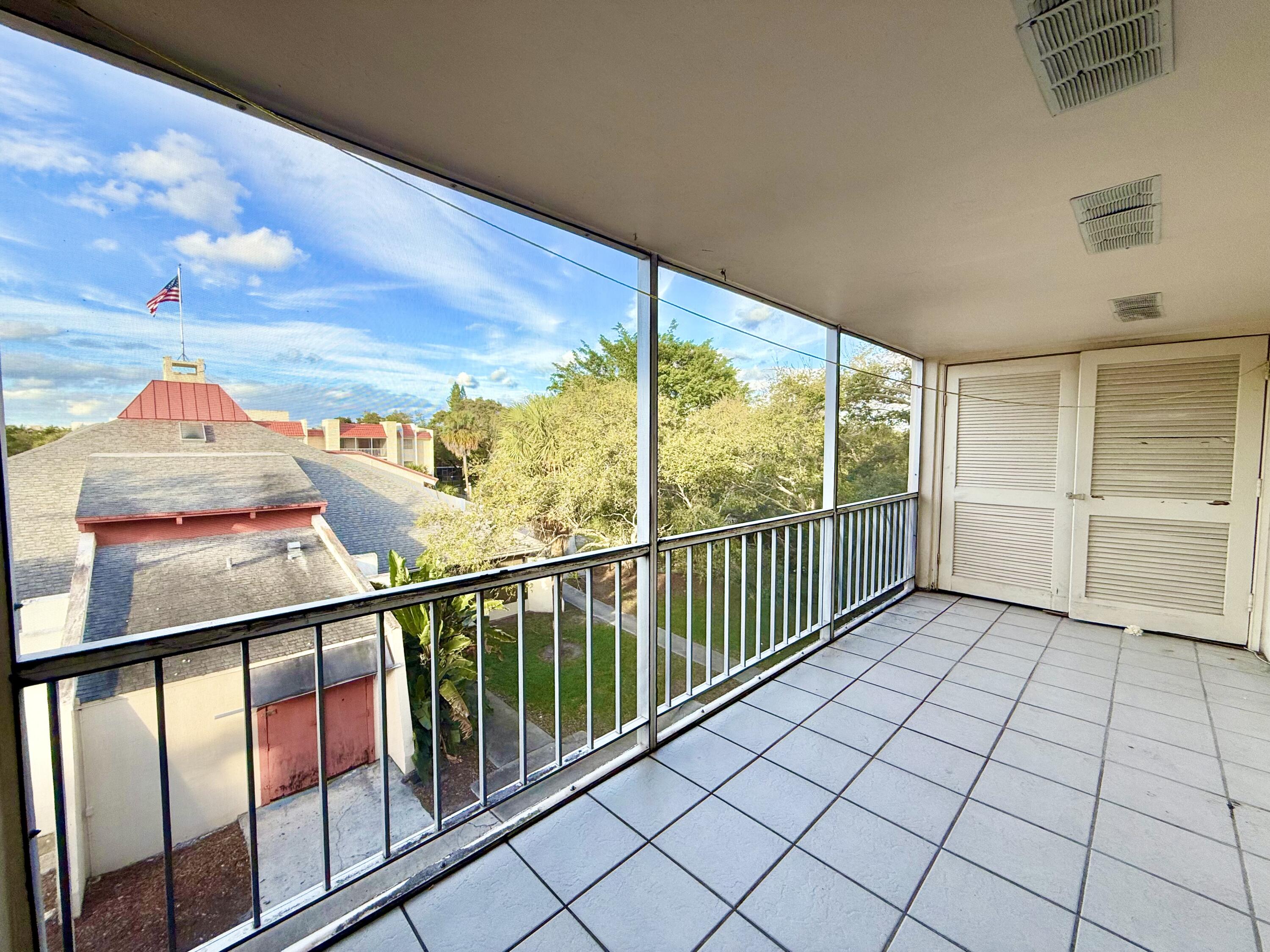 644 Northwest 13th Street, Unit 36 Boca Raton, FL 33486 - Photo 13 of 21 Screened Balcony