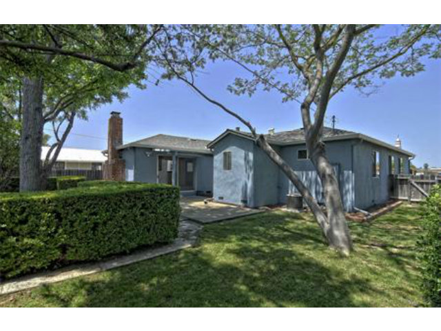 15308 Woodard Road San Jose, CA 95124 - Photo 8 of 10 a front view of a house with a garden