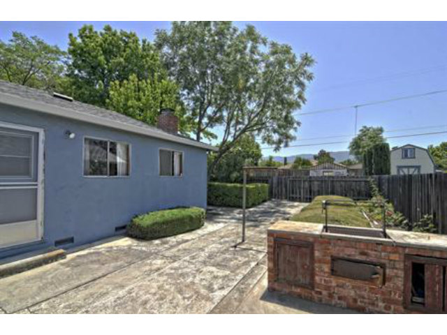 15308 Woodard Road San Jose, CA 95124 - Photo 9 of 10 a backyard of a house with barbeque oven