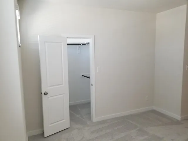 an empty room with closet