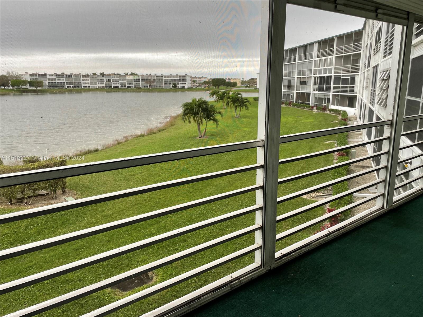 2085 Exeter, Unit 2085 Boca Raton, FL 33434 - Photo 16 of 31 a view of a balcony with lake view and a ocean view