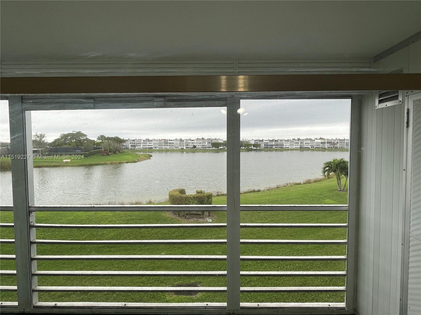 2085 Exeter, Unit 2085 Boca Raton, FL 33434 - Photo 17 of 31 a view of a balcony with a lake view