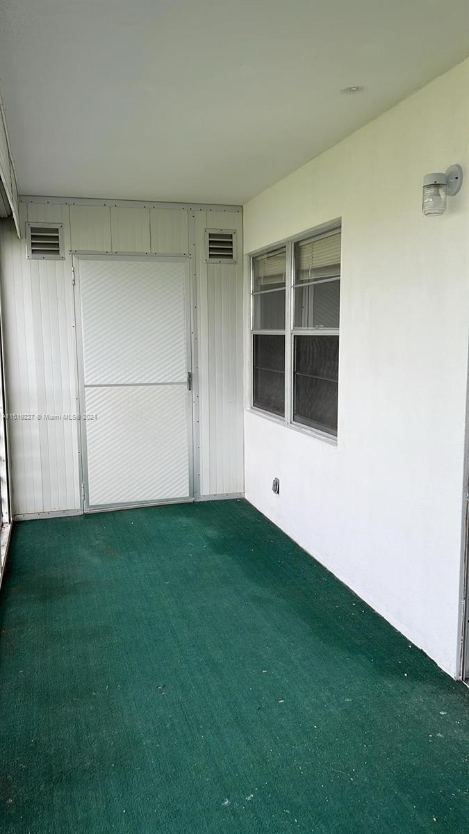 2085 Exeter, Unit 2085 Boca Raton, FL 33434 - Photo 18 of 31 a view of an entrance of the house