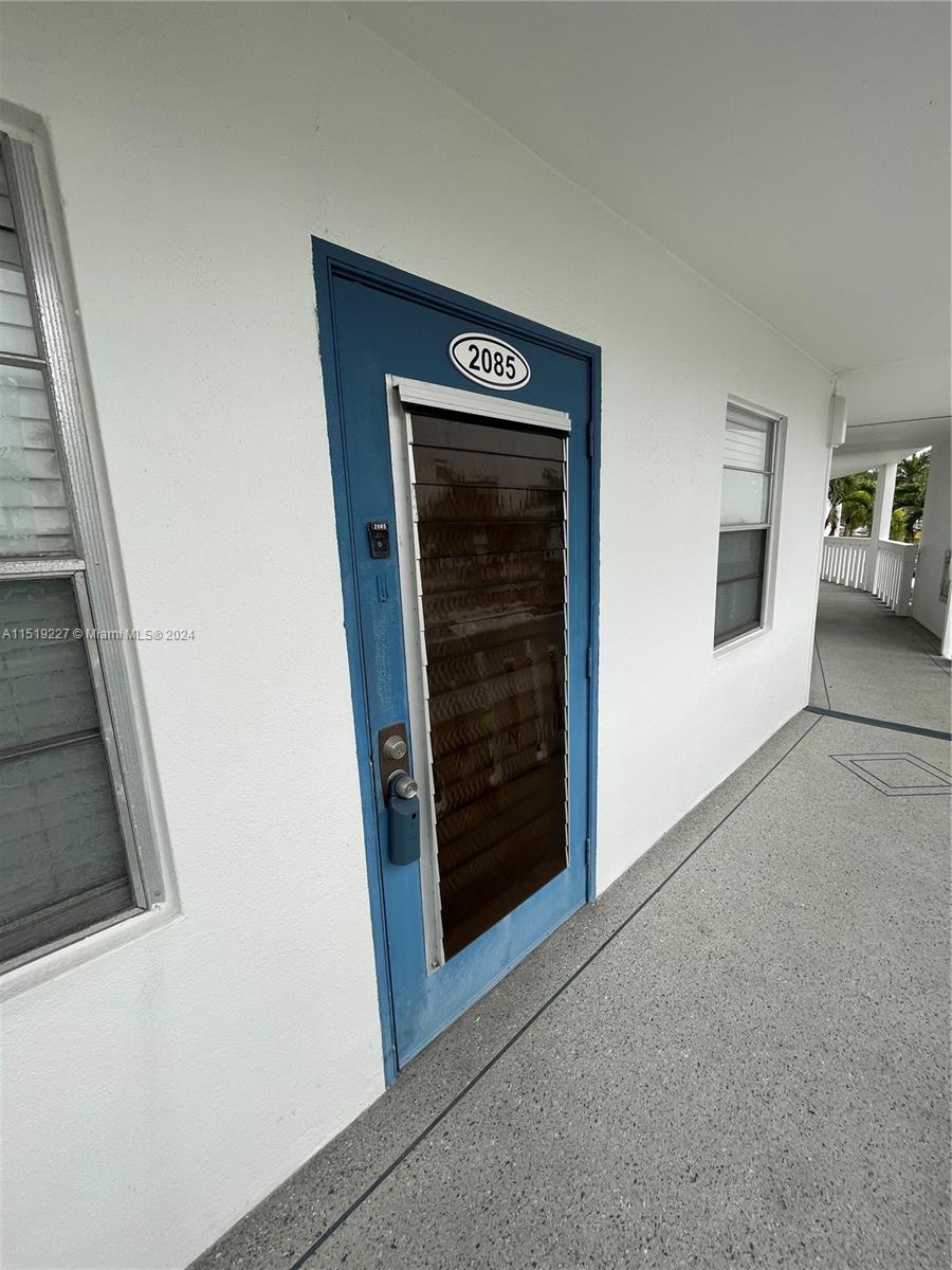 2085 Exeter, Unit 2085 Boca Raton, FL 33434 - Photo 20 of 31 a view of an entryway door