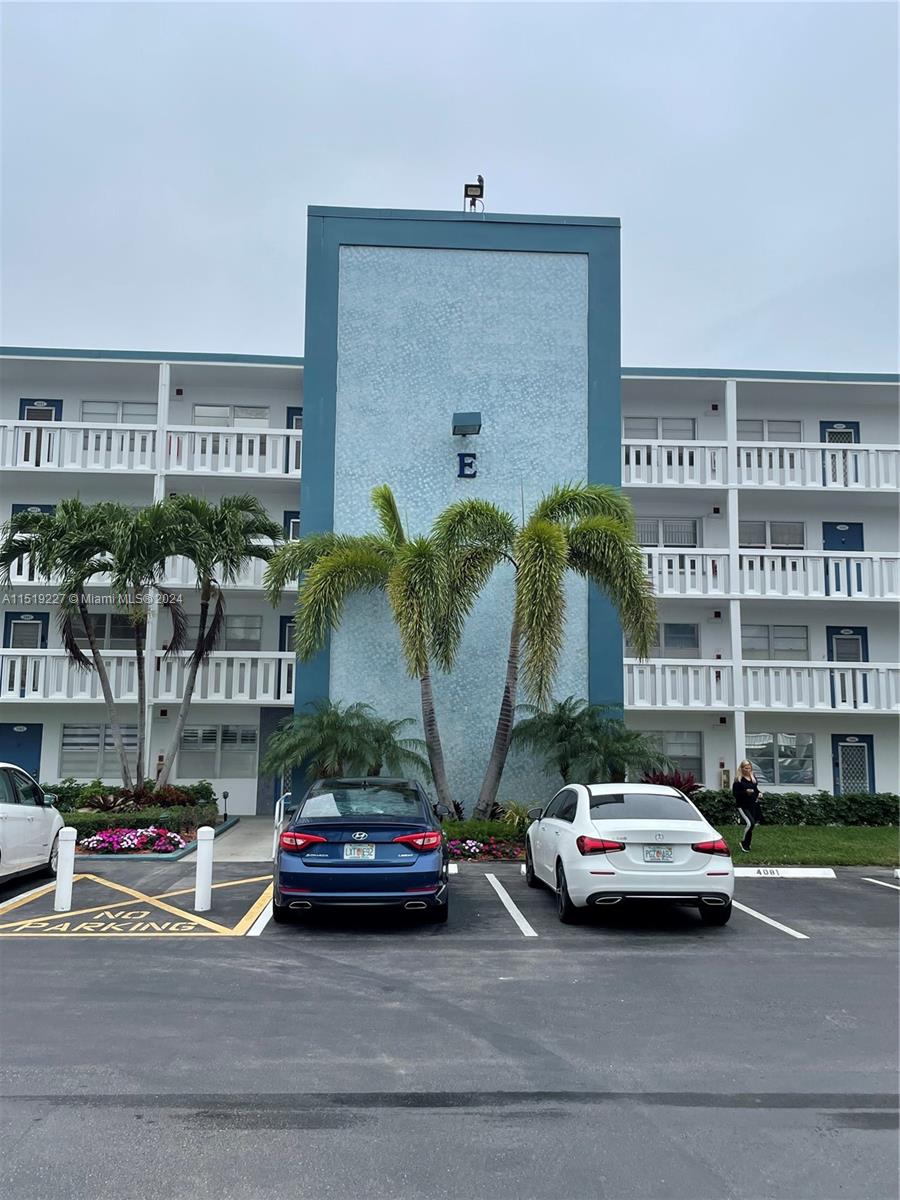 2085 Exeter, Unit 2085 Boca Raton, FL 33434 - Photo 22 of 31 a car parked in front of a building