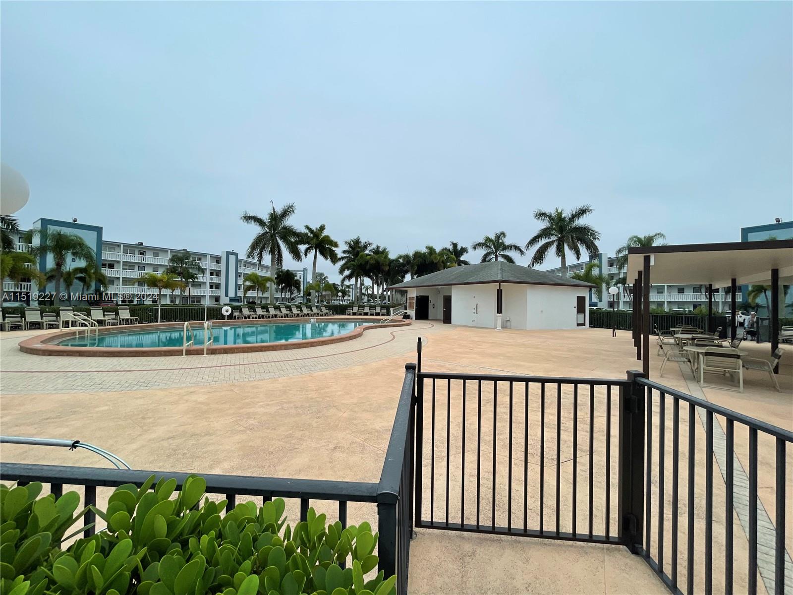 2085 Exeter, Unit 2085 Boca Raton, FL 33434 - Photo 28 of 31 a view of a street from a balcony
