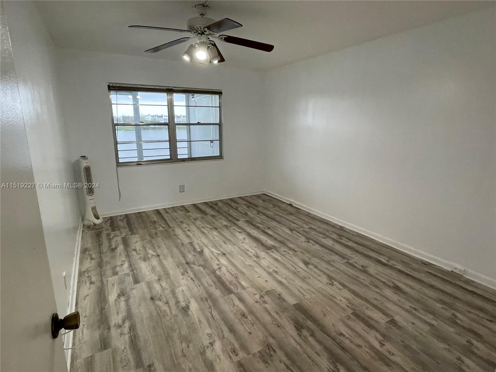2085 Exeter, Unit 2085 Boca Raton, FL 33434 - Photo 3 of 31 an empty room with windows