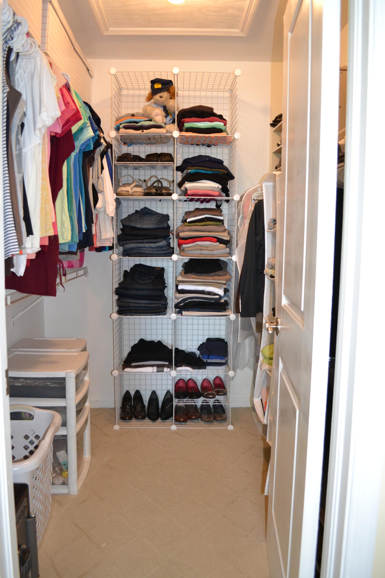 201 Southwest 1st Street, Unit 8 Boca Raton, FL 33432 - Photo 13 of 27 a view of walk in closet with clothes and shoes
