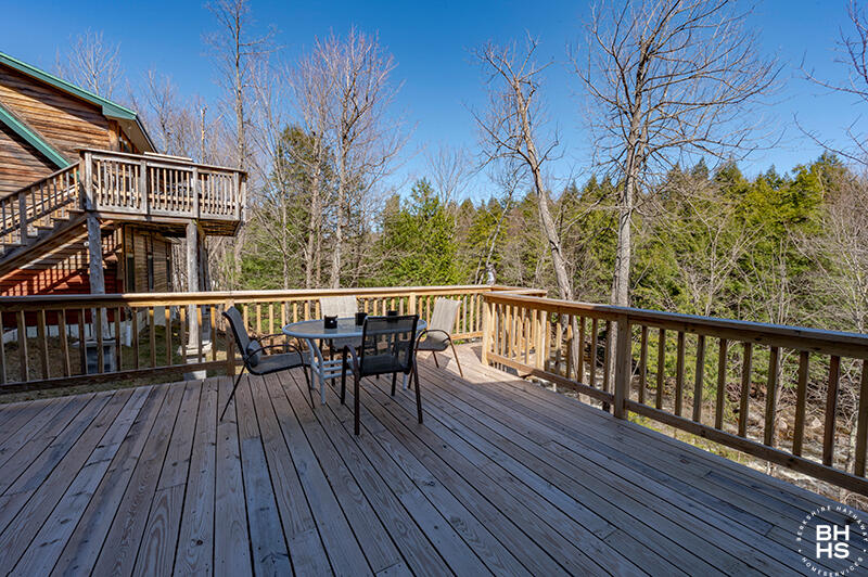667 Days Mills Road St. Regis Falls, NY 12980 - Photo 10 of 51 HomeOnLakeOzoniaOutlet_Deck