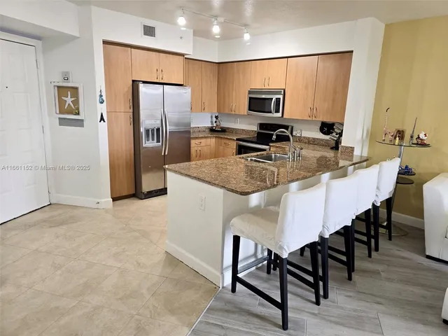 $319,000 | 1830 Radius Drive, Unit 1024, Hollywood, FL 33020