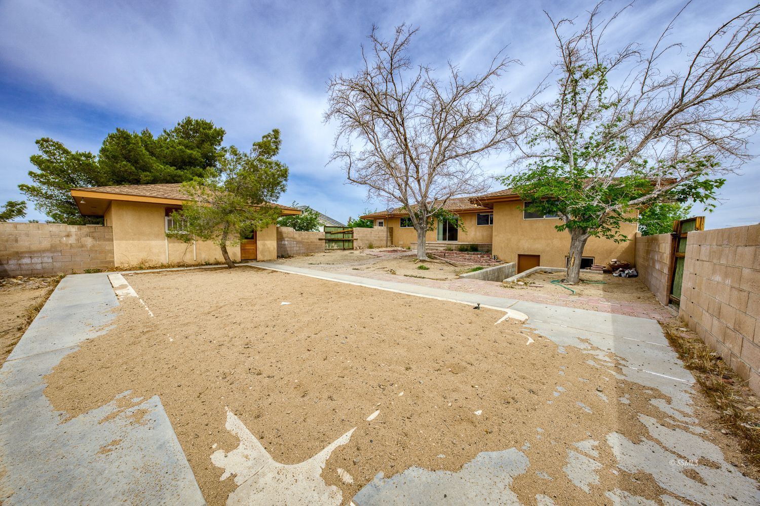 1313 Autumn Avenue Ridgecrest, CA 93555 - Photo 34 of 50 a view of a yard with a tree
