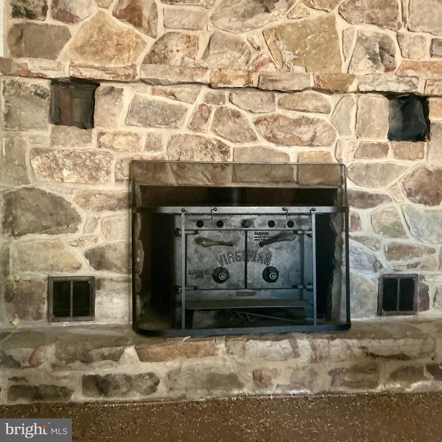 252 Mt Union Road Fayetteville, PA 17222 - Photo 38 of 49 Basement wood burning fireplace