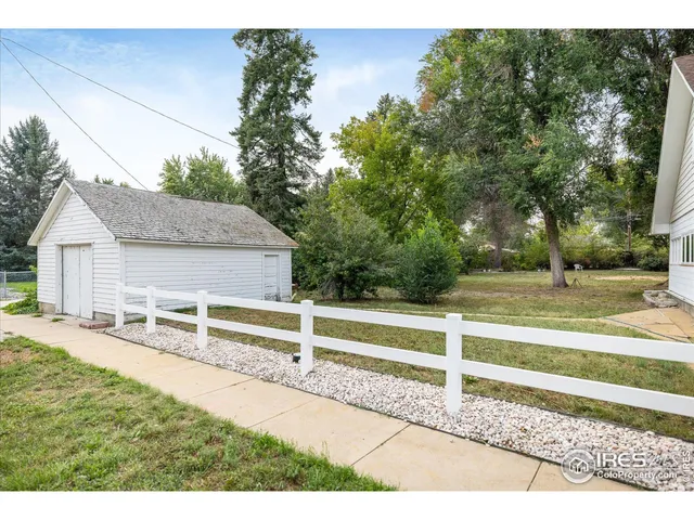 a view of backyard with green space