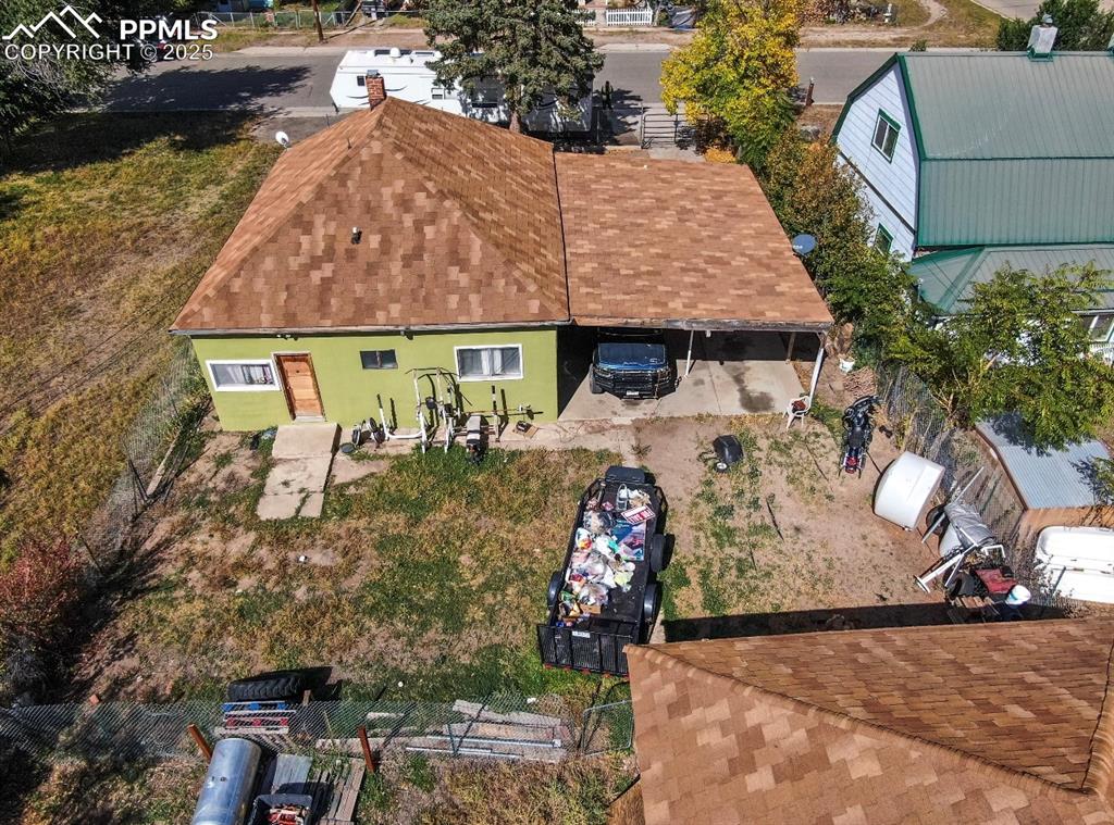 129 West 9th Street Walsenburg, CO 81089 - Photo 17 of 23 an aerial view of a house with garden space and sitting area