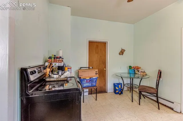 a view of a room with furniture and toys