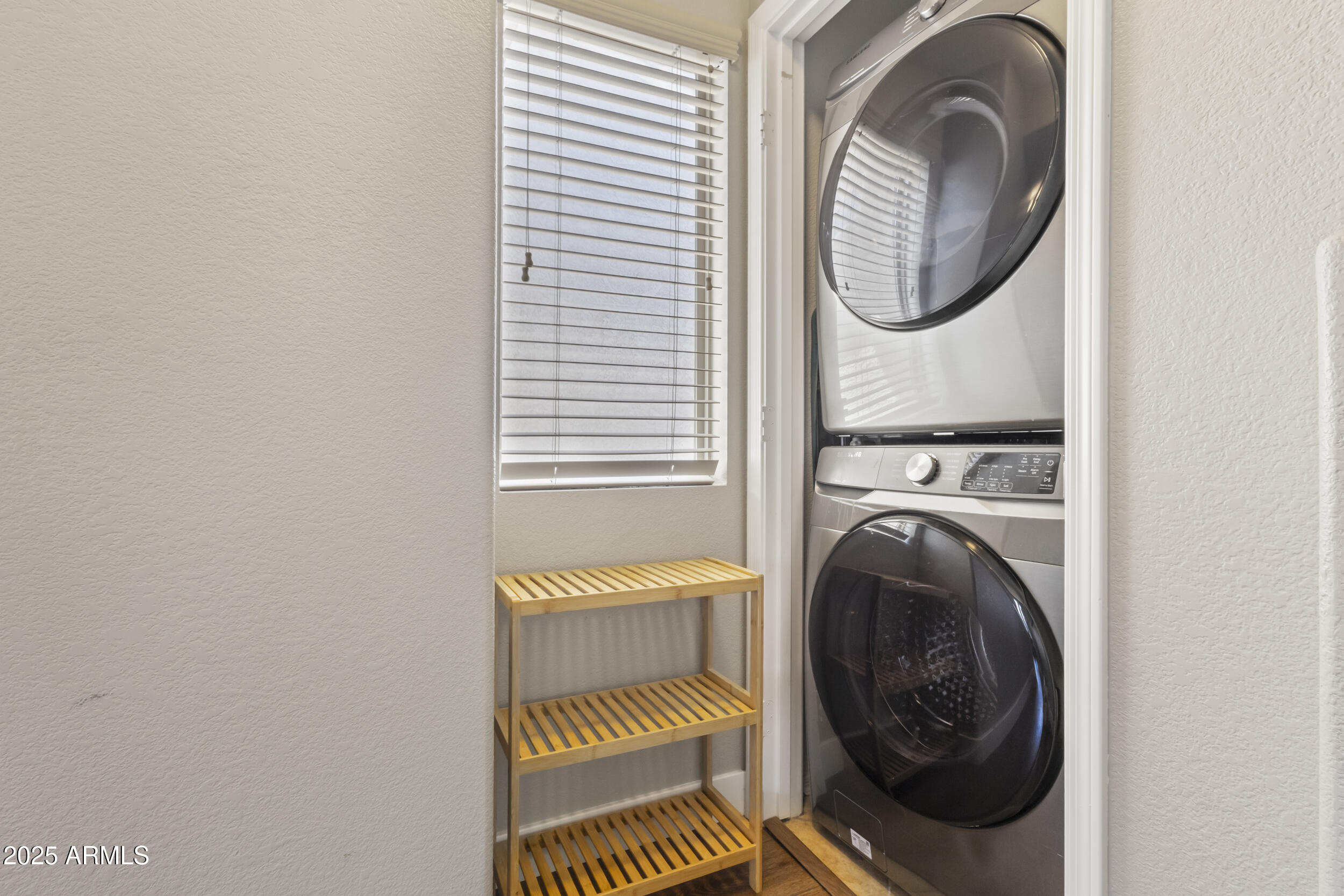280 South Evergreen Road, Unit 1287 Tempe, AZ 85288 - Photo 14 of 28 a view of a bedroom with washer and dryer