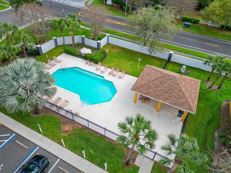 29924 Playa Del Rey Lane Wesley Chapel, FL 33543 - Photo 29 of 31 an aerial view of a house with a yard and lake view