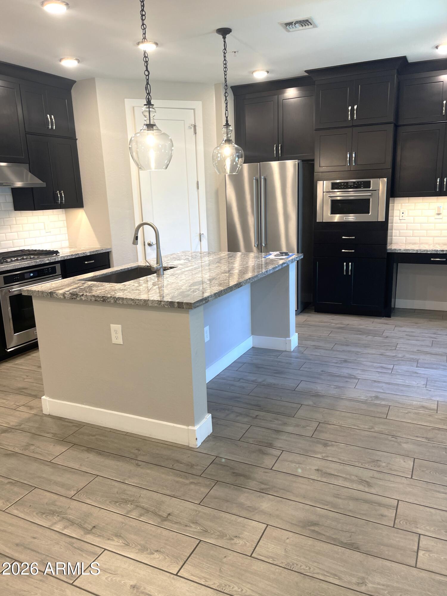 3855 South McQueen Road, Unit 21 Chandler, AZ 85286 - Photo 8 of 28 20260701_183934155_iOS