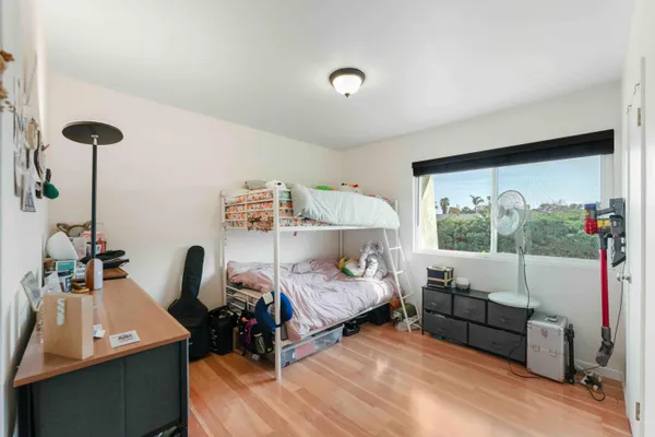 a bed room with furniture and a window