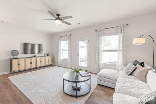 a living room with furniture and window
