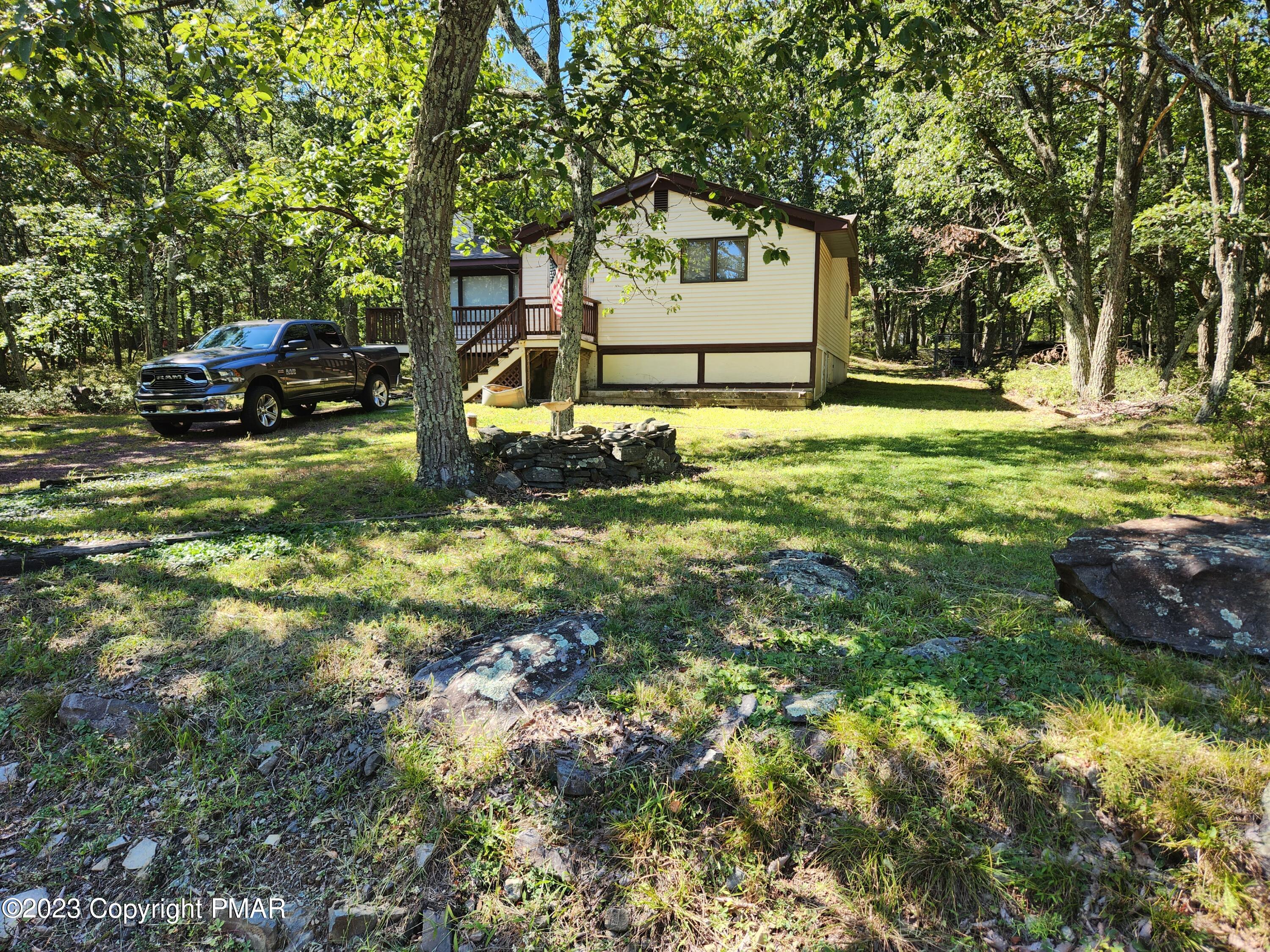 218 Mallard Lane Bushkill, PA 18324 - Photo 2 of 14 a view of a house with a yard