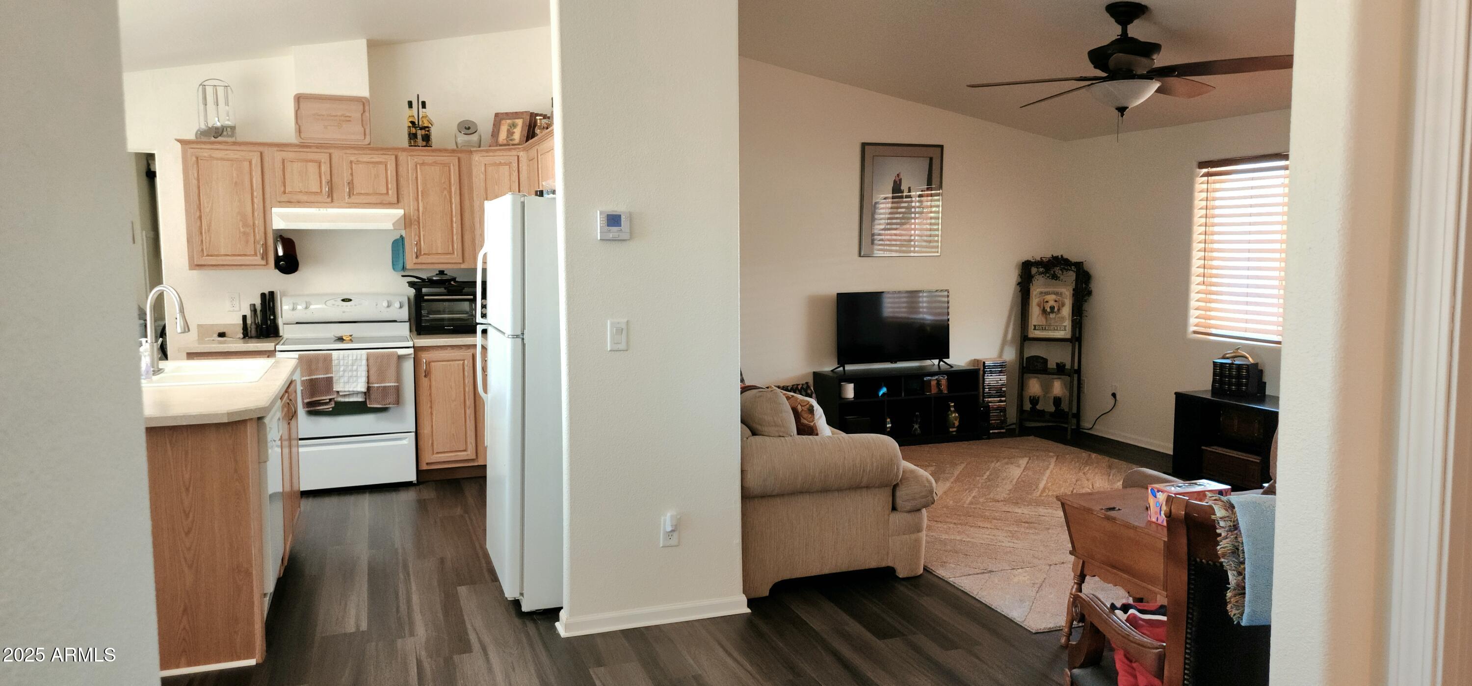 234 West Lone Ranger Trail Tonto Basin, AZ 85553 - Photo 14 of 27 a living room with furniture and a flat screen tv