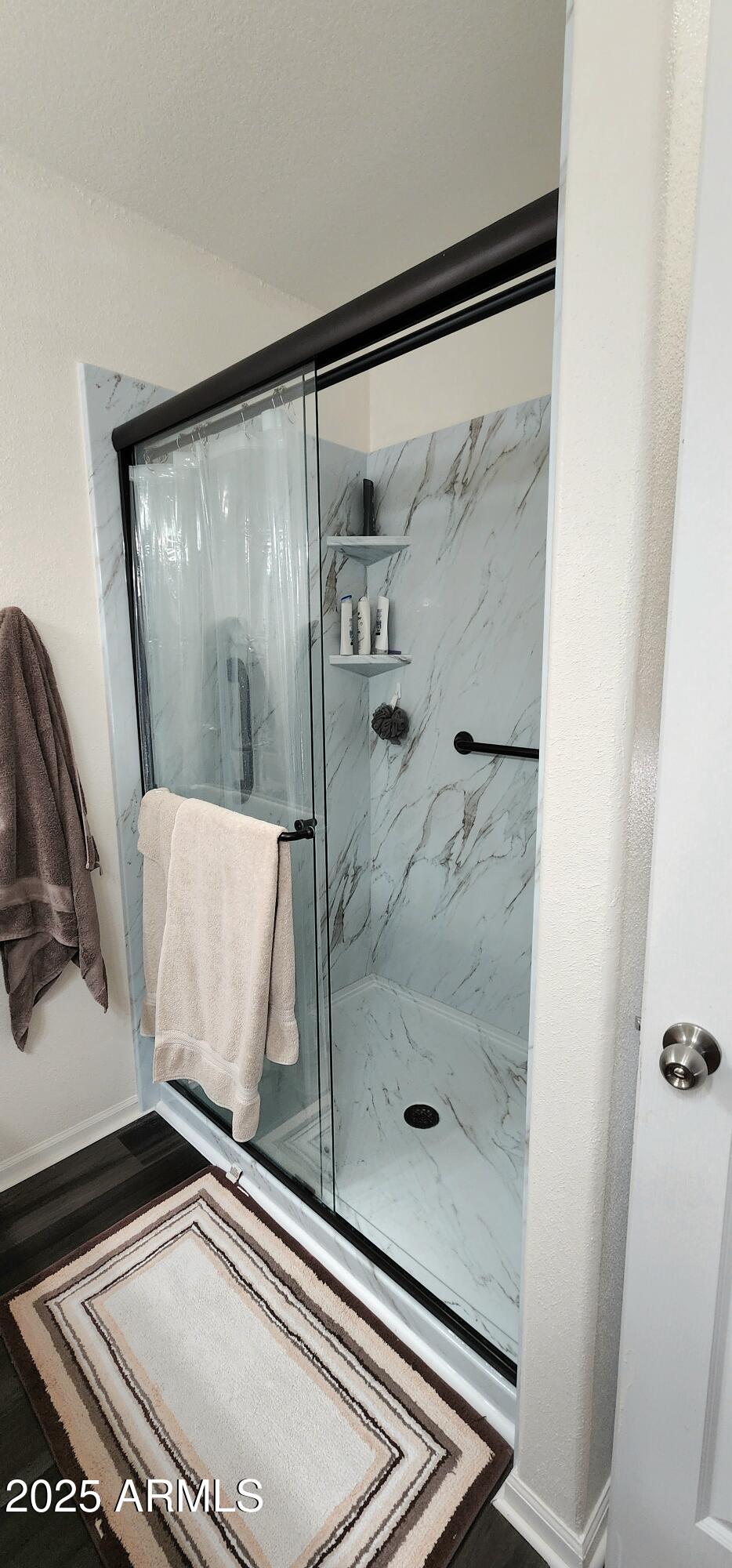 234 West Lone Ranger Trail Tonto Basin, AZ 85553 - Photo 22 of 27 a bathroom with a shower and a sink