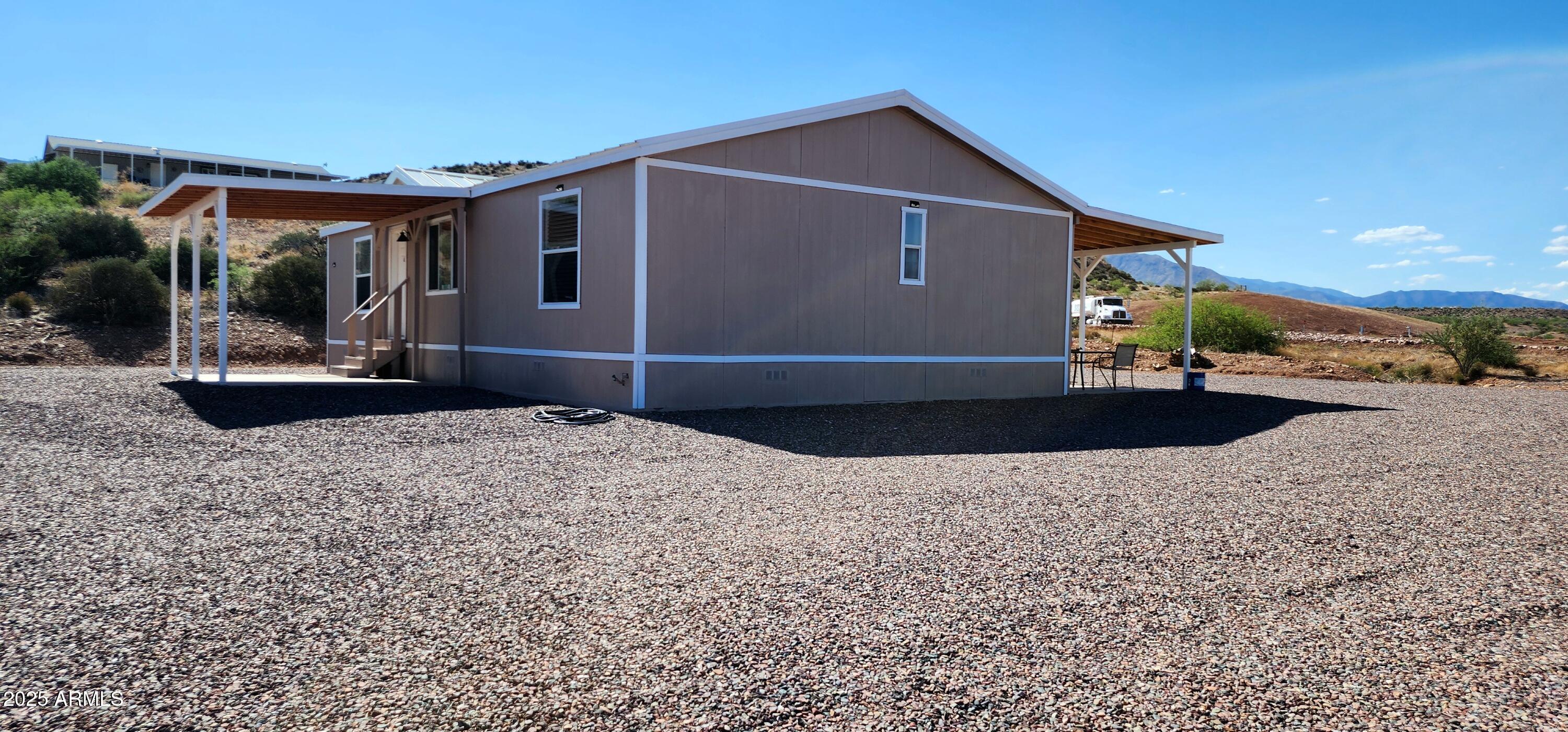 234 West Lone Ranger Trail Tonto Basin, AZ 85553 - Photo 5 of 27 a front view of a house with entertaining space