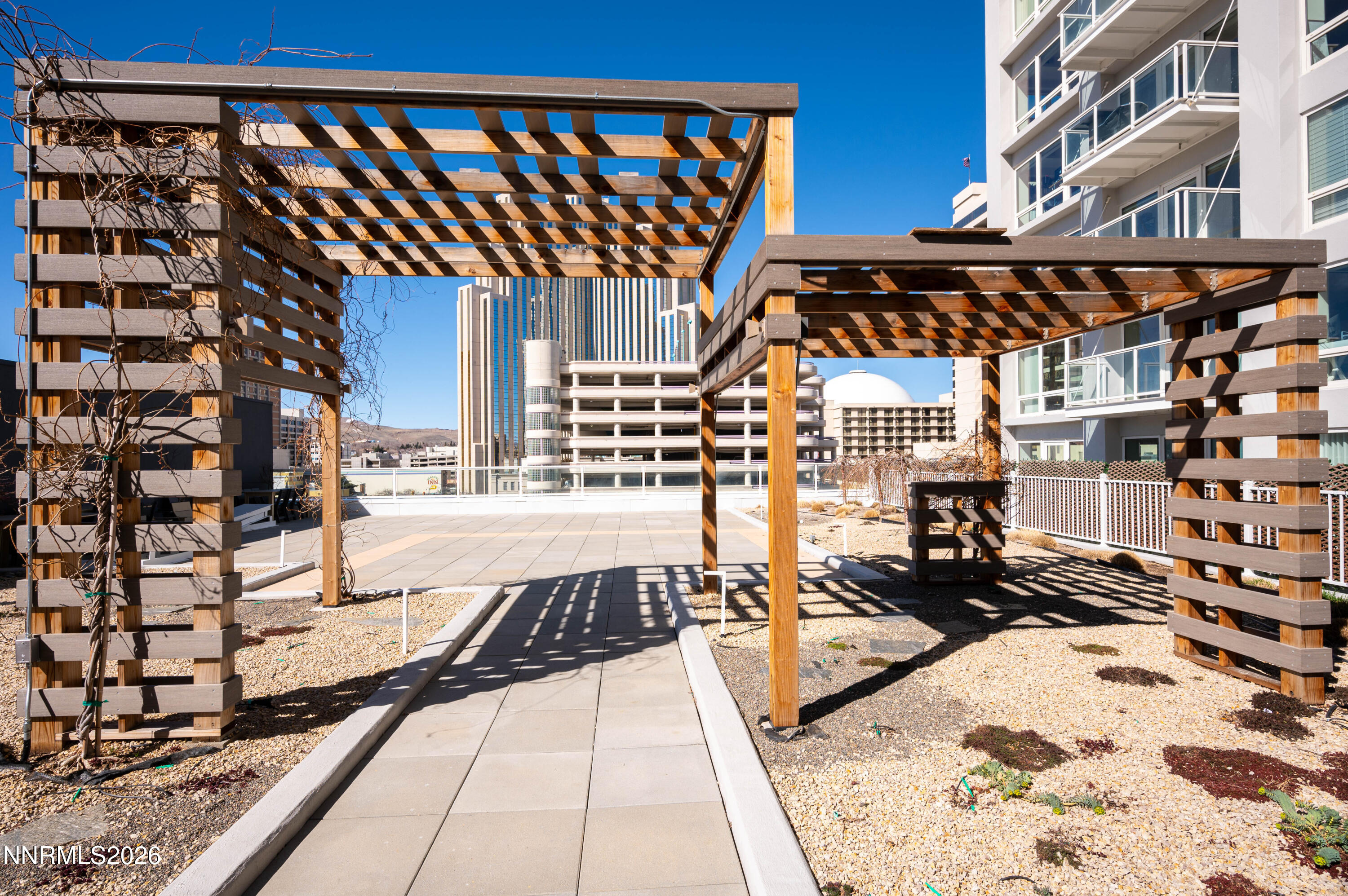 255 North Sierra Street, Unit 517 Reno, NV 89501 - Photo 11 of 43 a view of a patio with a table and chairs